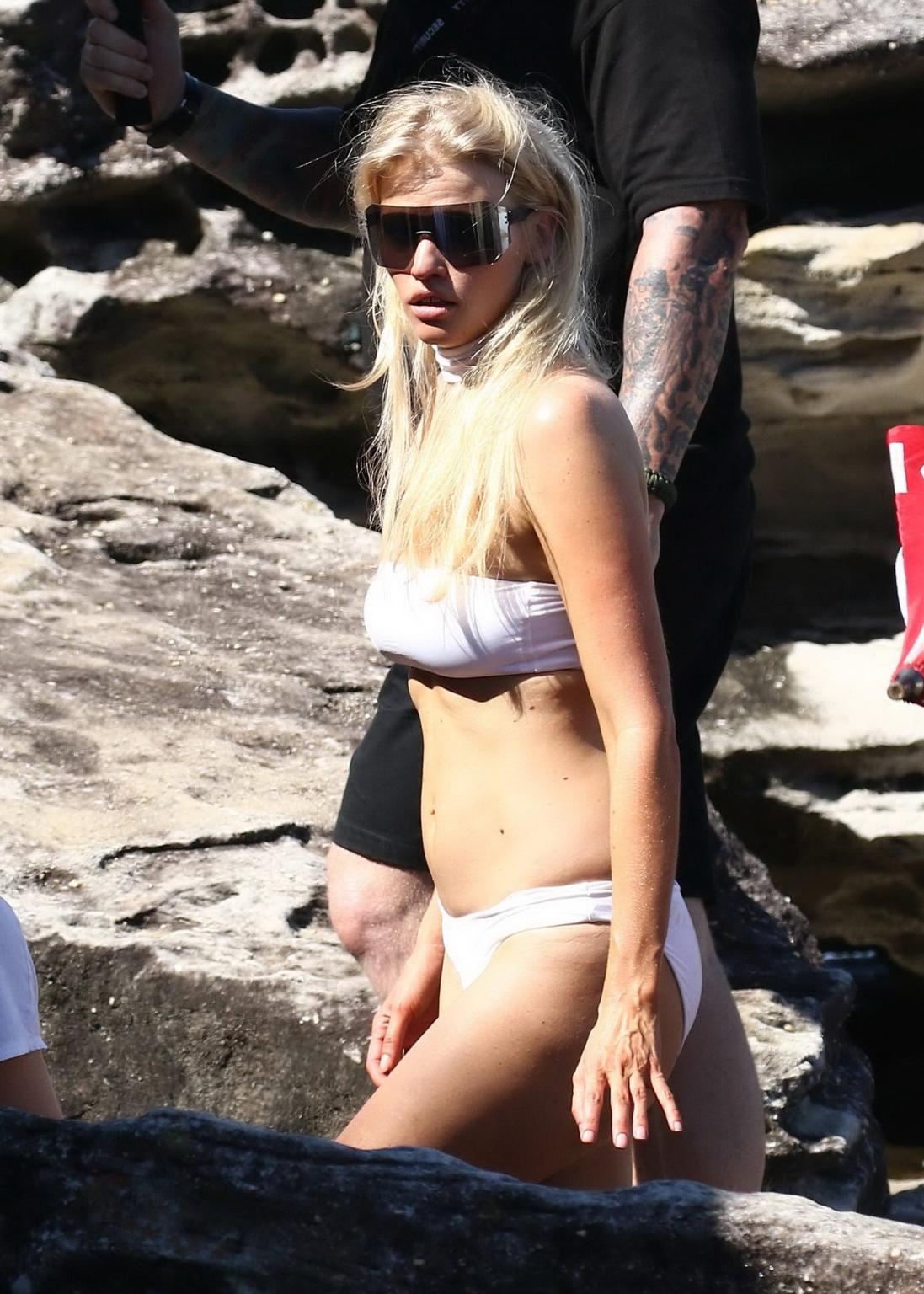 16P Lara Stone showing pokies and cameltoe in white bikini