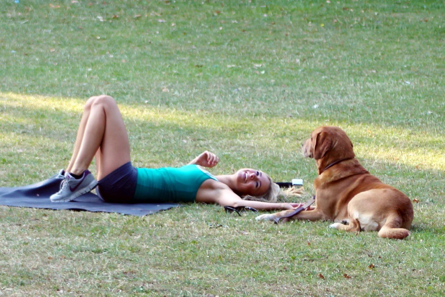 16P Kimberley Garner working out in a park