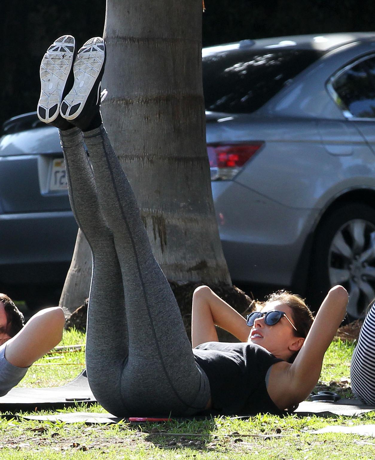 16P Alessandra Ambrosio shows off her ass in tights while working out at a park in S