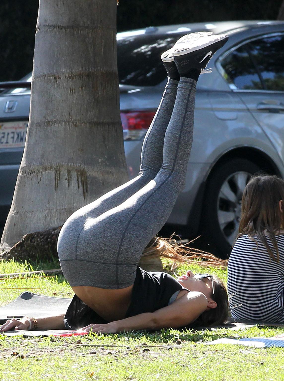 16P Alessandra Ambrosio shows off her ass in tights while working out at a park in S