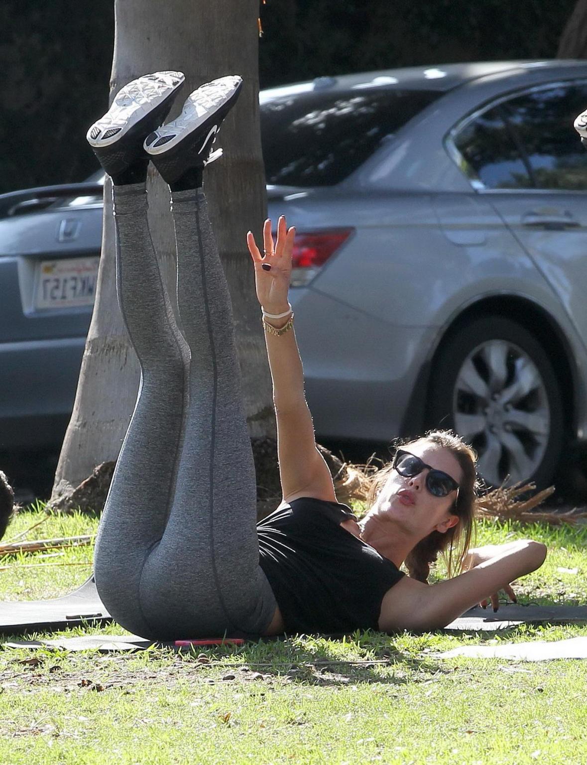16P Alessandra Ambrosio shows off her ass in tights while working out at a park in S