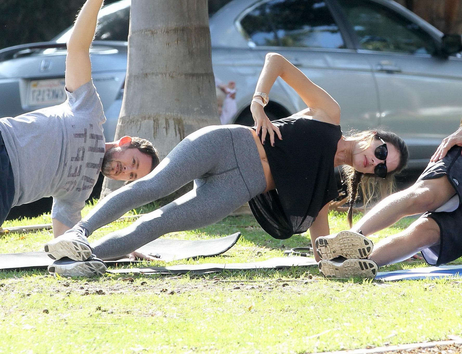 16P Alessandra Ambrosio shows off her ass in tights while working out at a park in S