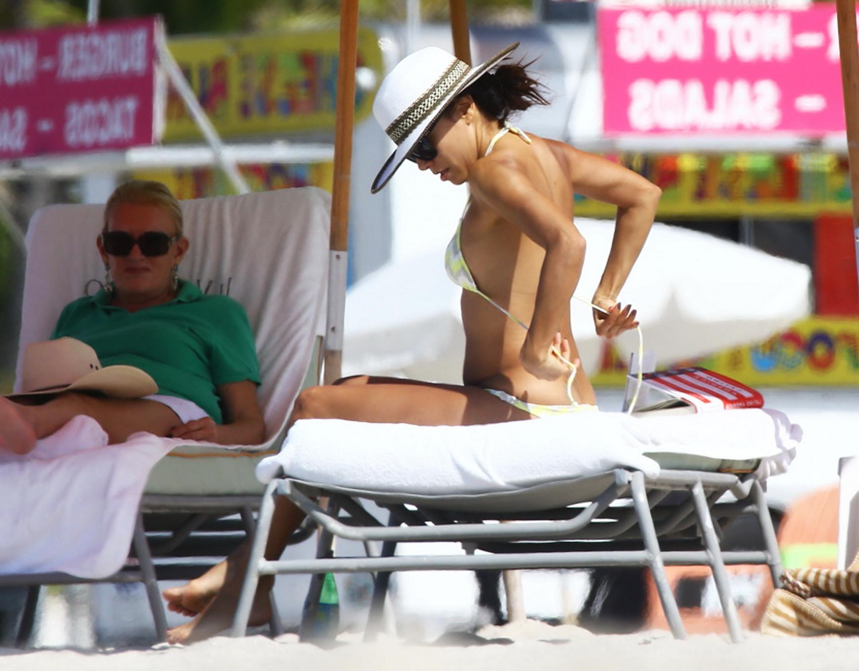 16P Eva Longoria shows her ass and cameltoe while tanning topless at the beach in Mi