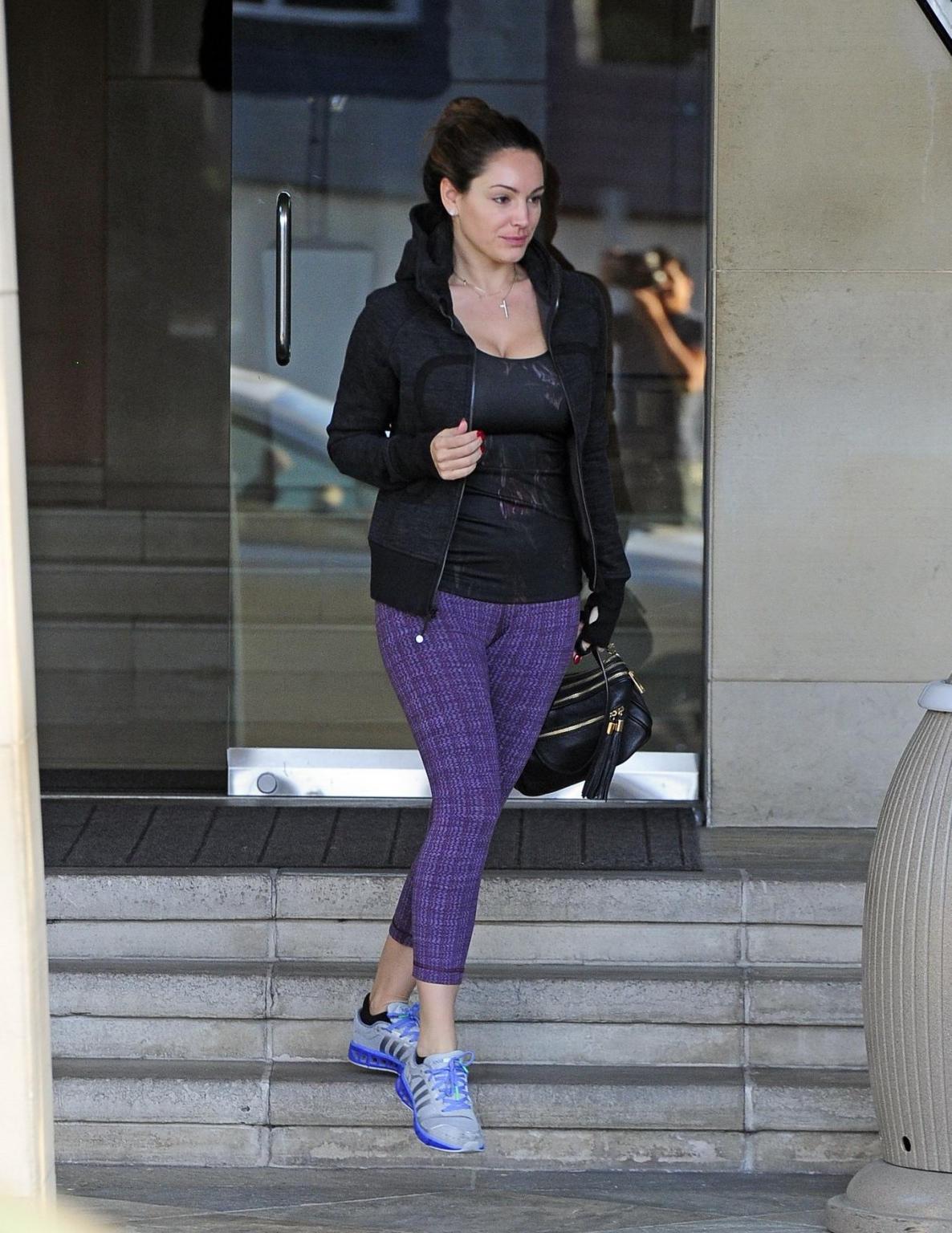 16P Kelly Brook shows off her ass, cleavage and cameltoe wearing a tight sports outf