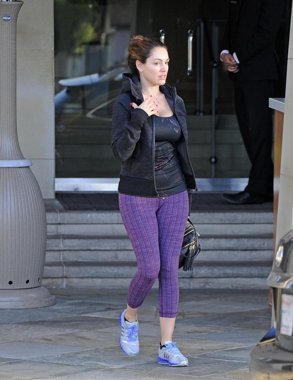 16P Kelly Brook shows off her ass, cleavage and cameltoe wearing a tight sports outf