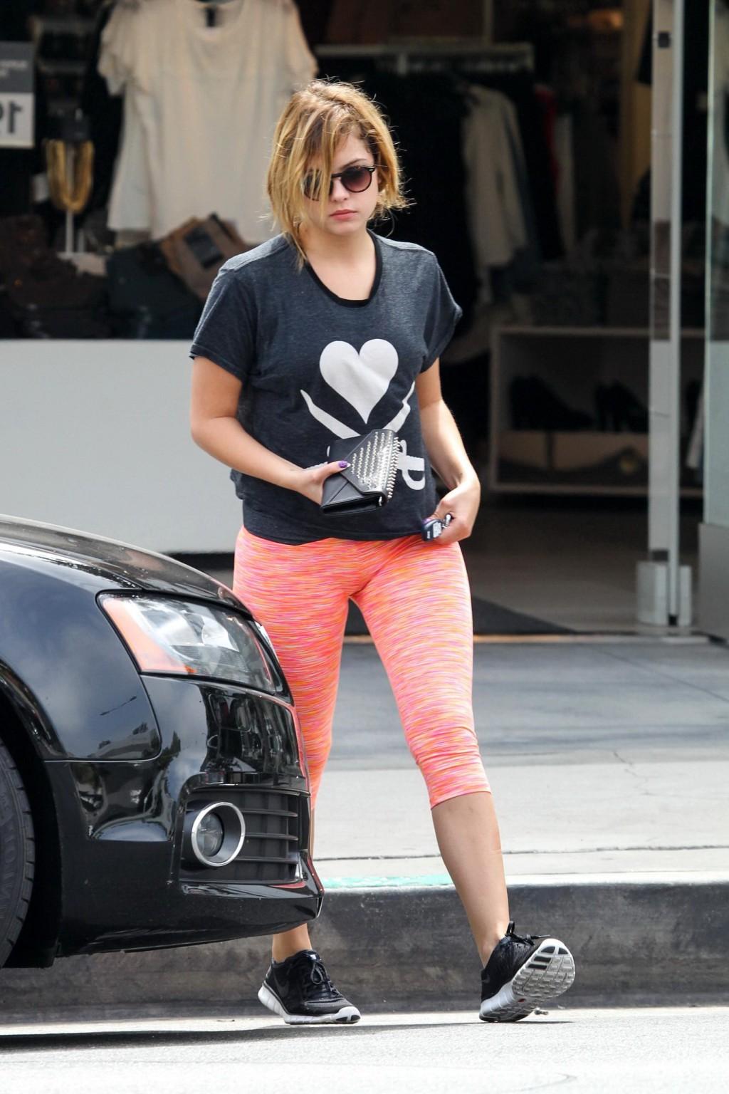 16P Ashley Benson shows off her ass  cameltoe wearing tights out in West Hollywood