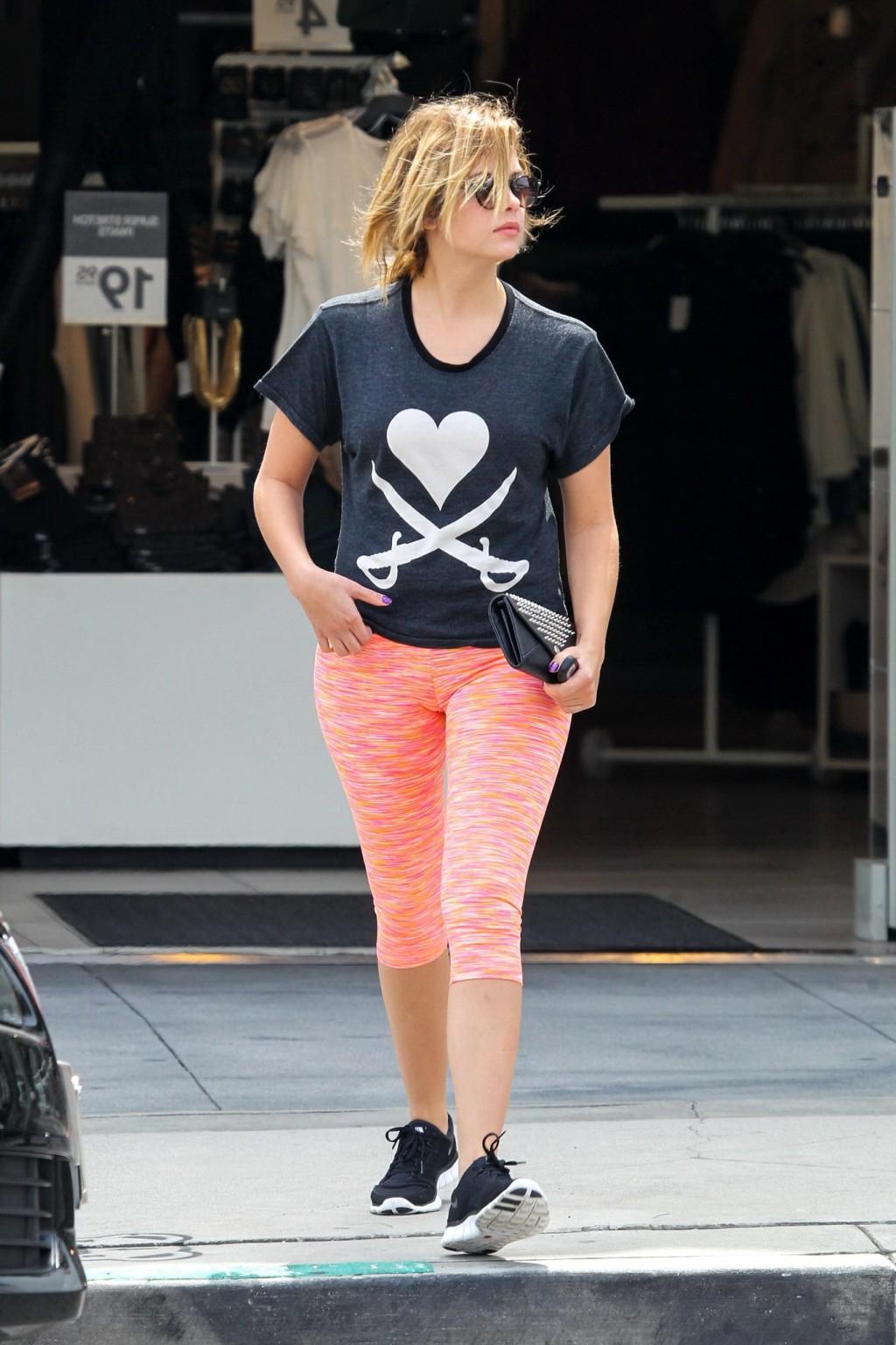 16P Ashley Benson shows off her ass  cameltoe wearing tights out in West Hollywood