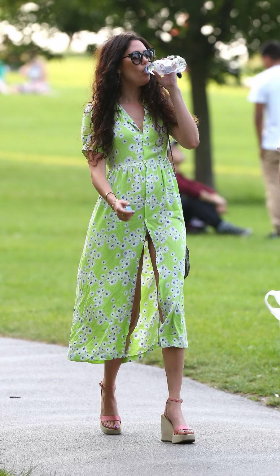 16P Eliza Doolittle upskirt wearing wide open green floral dress at the park in Lond