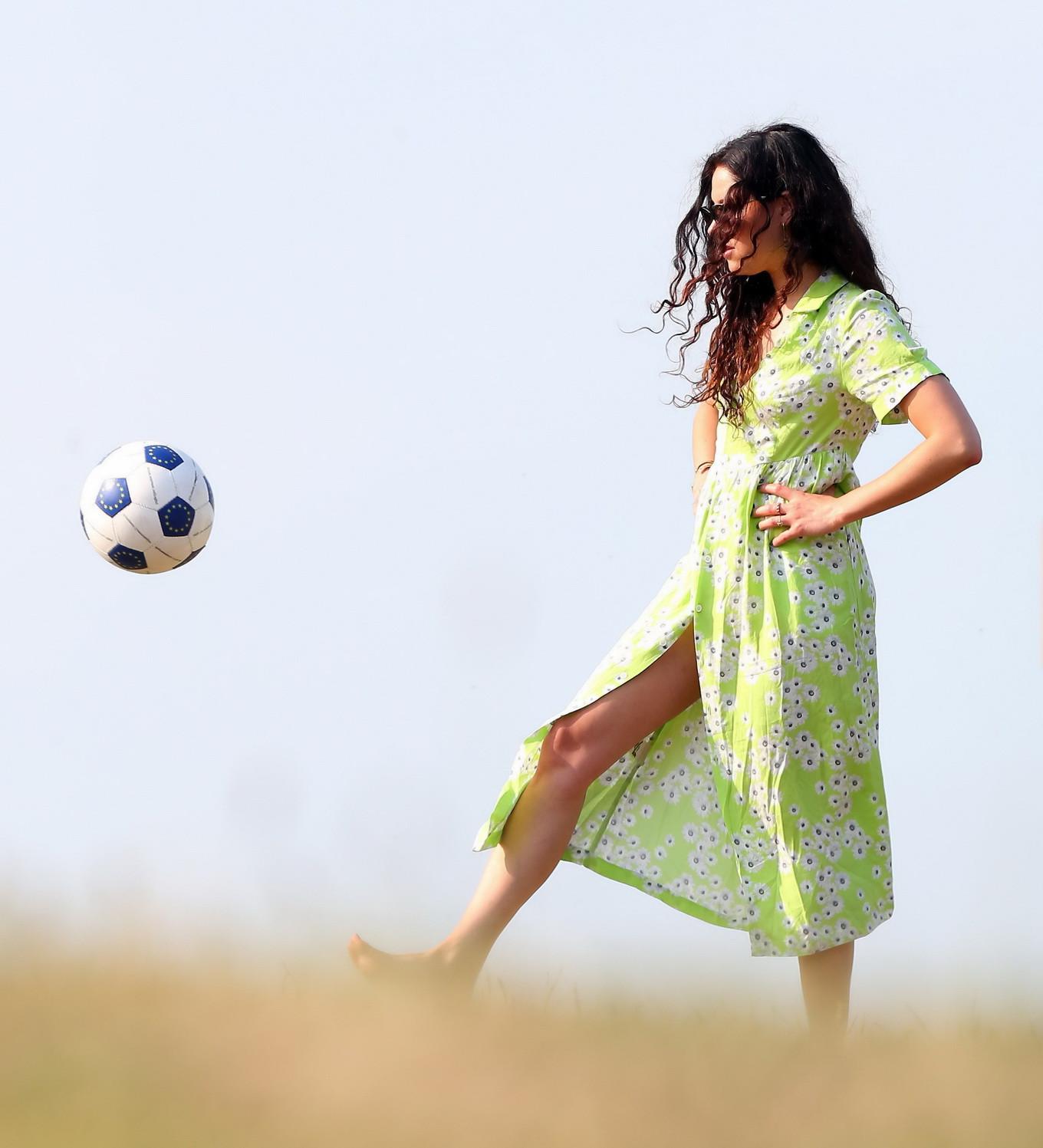 16P Eliza Doolittle upskirt wearing wide open green floral dress at the park in Lond