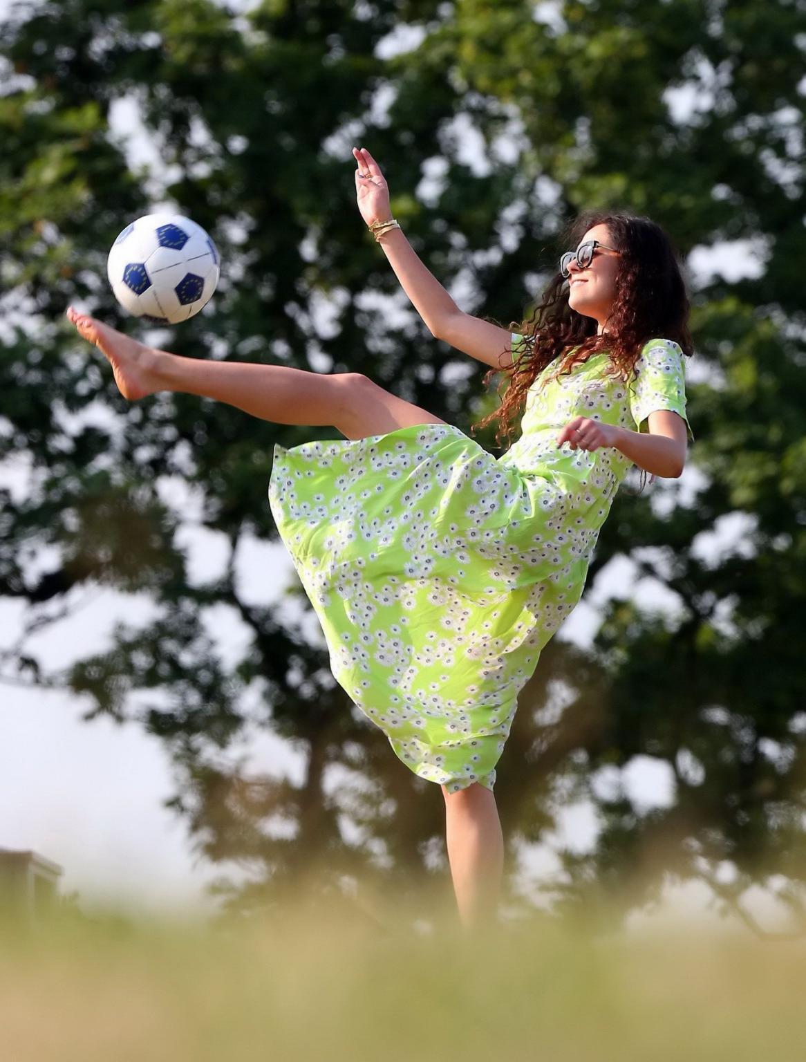 16P Eliza Doolittle upskirt wearing wide open green floral dress at the park in Lond