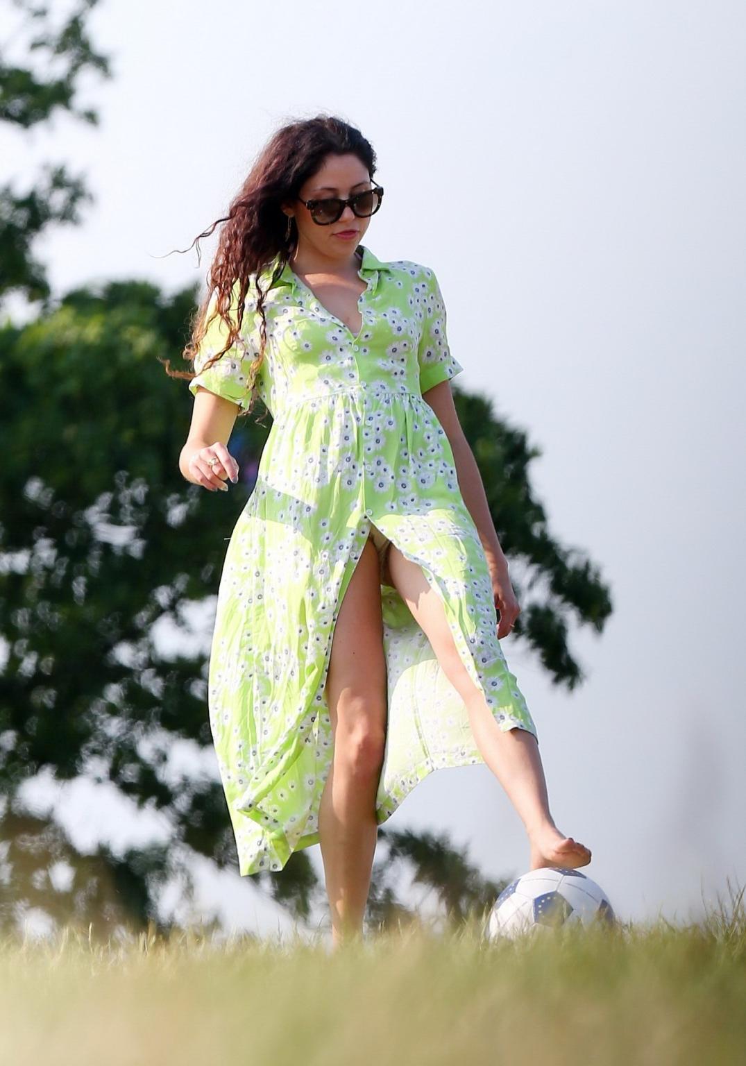16P Eliza Doolittle upskirt wearing wide open green floral dress at the park in Lond