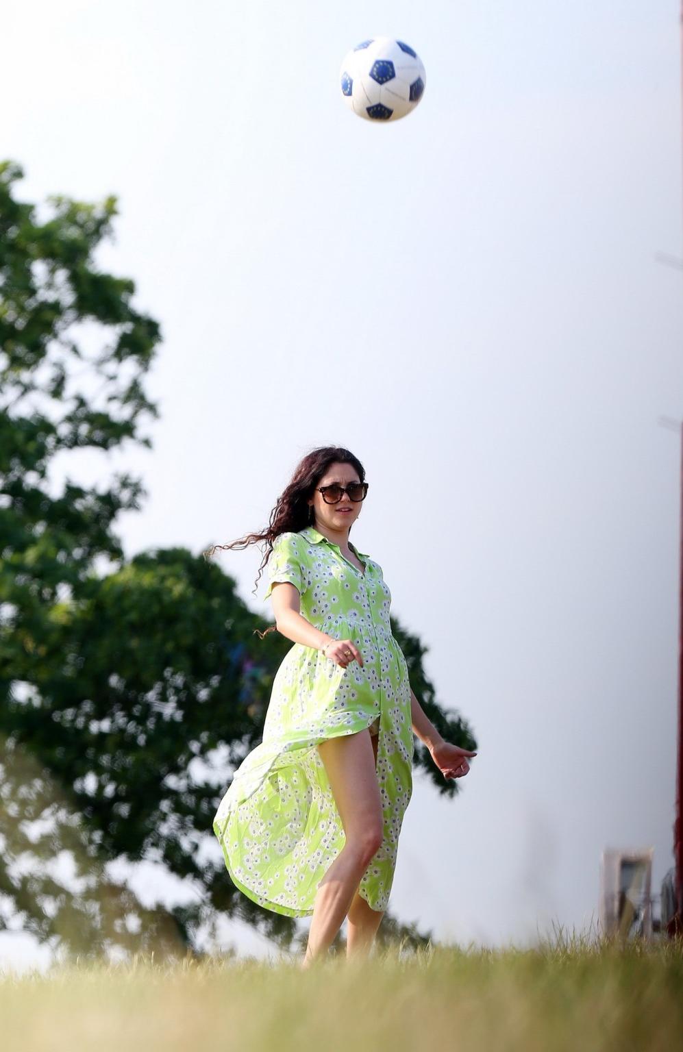 16P Eliza Doolittle upskirt wearing wide open green floral dress at the park in Lond