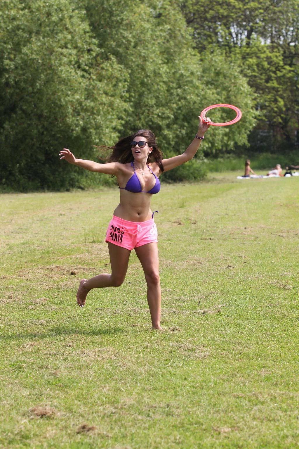 10P Imogen Thomas stripping to a purple bikini and tanning in the park in London