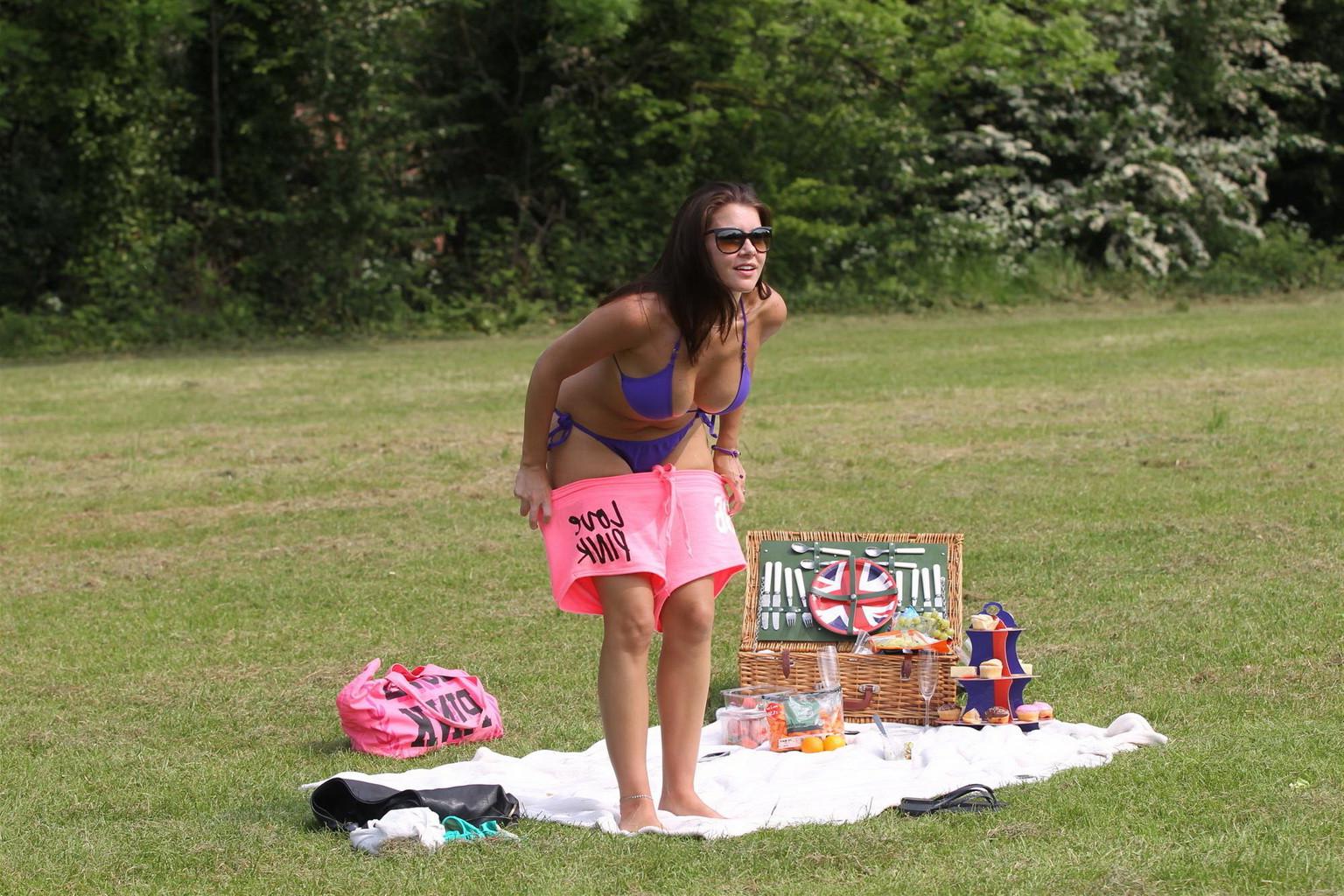10P Imogen Thomas stripping to a purple bikini and tanning in the park in London