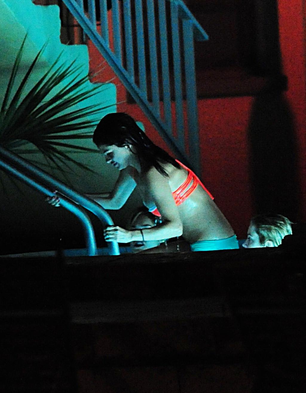 16P Selena Gomez shows cameltoe wearing bikini at the pool on 'Spring Breakers' set