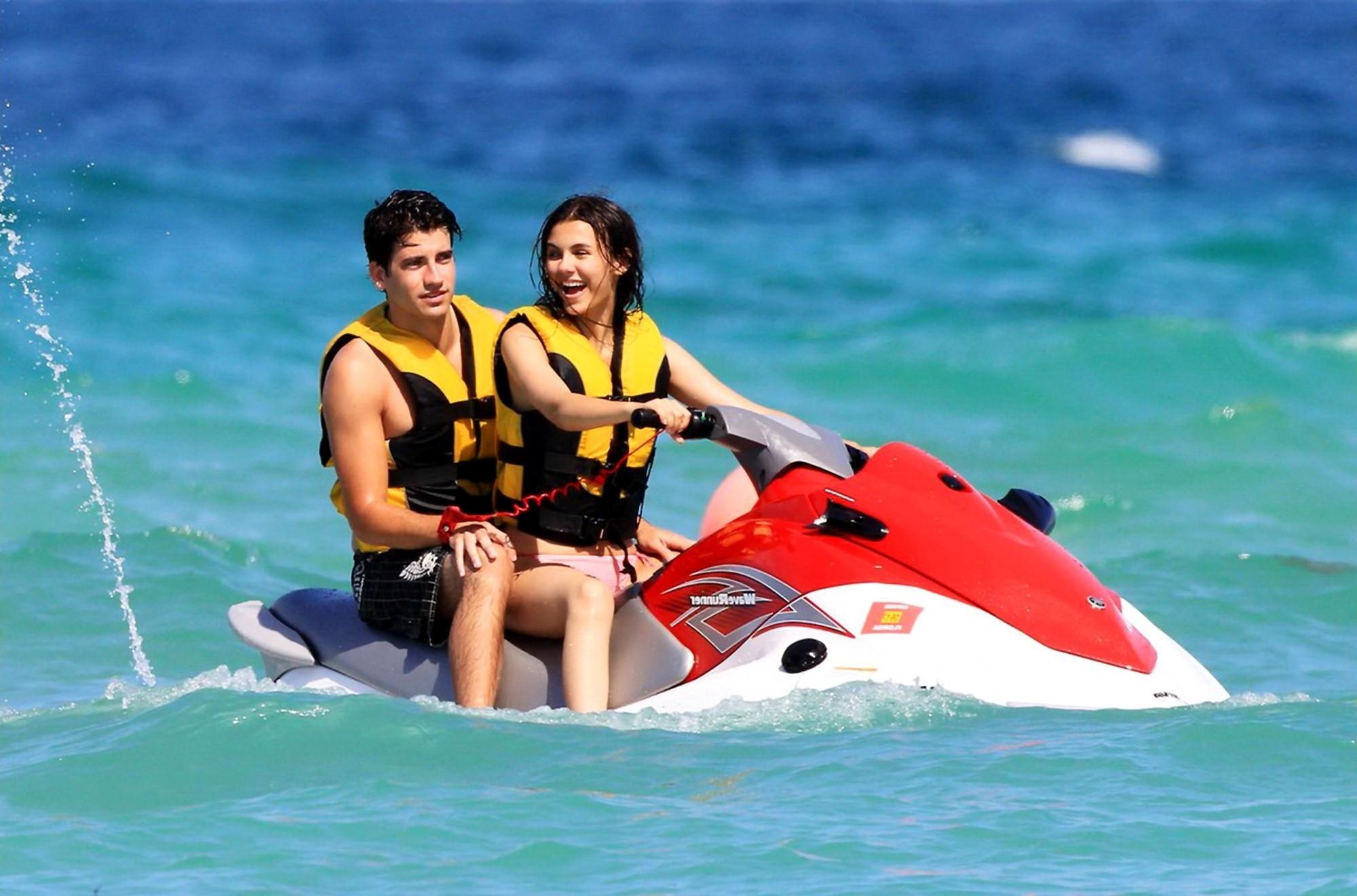 16P Victoria Justice shows cameltoe wearing wet bikini on a beach in Florida