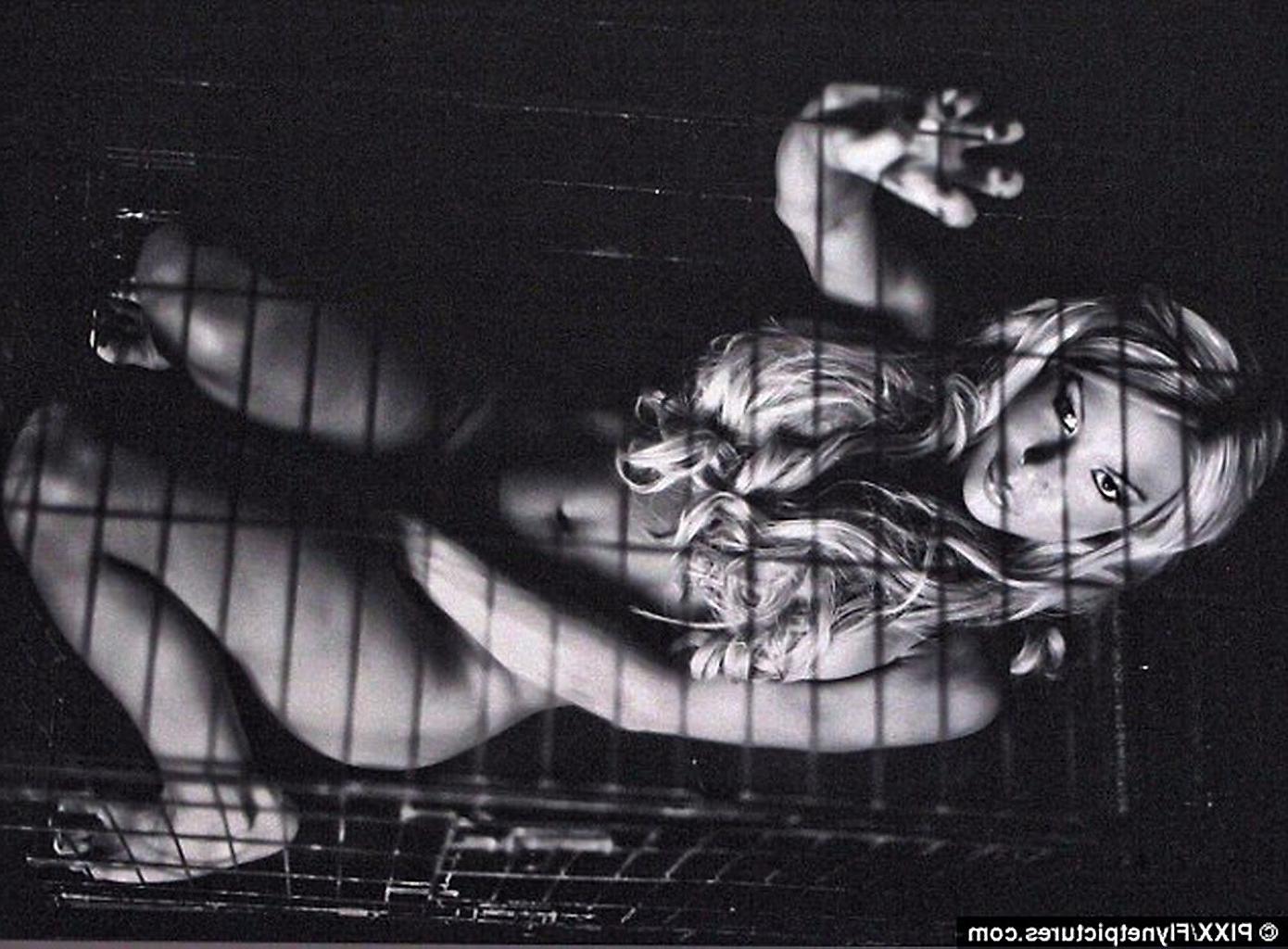 16P Brooke Hogan nude in cage for new PETA ad campaign