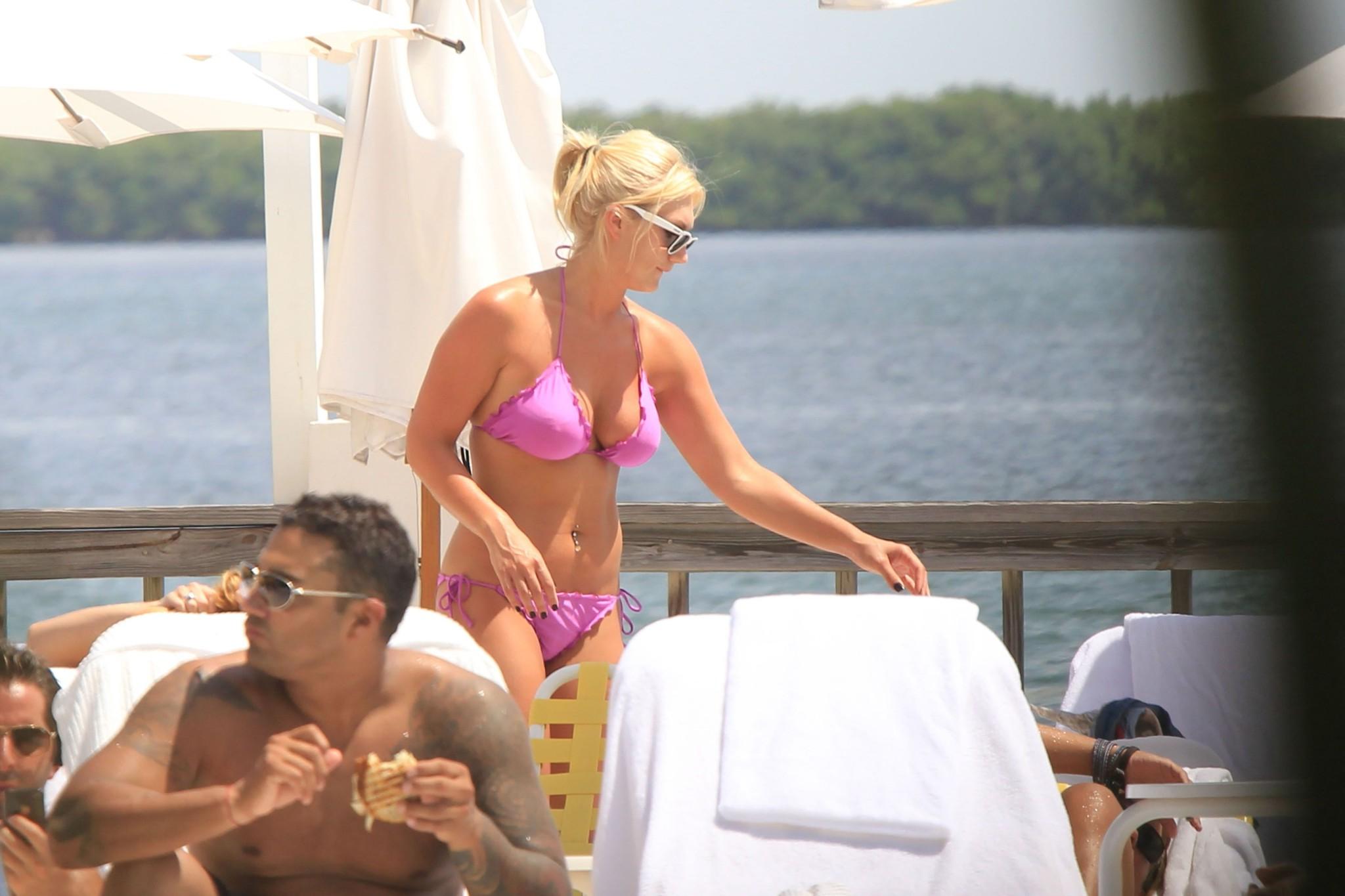 16P Brooke Hogan nude in cage for new PETA ad campaign