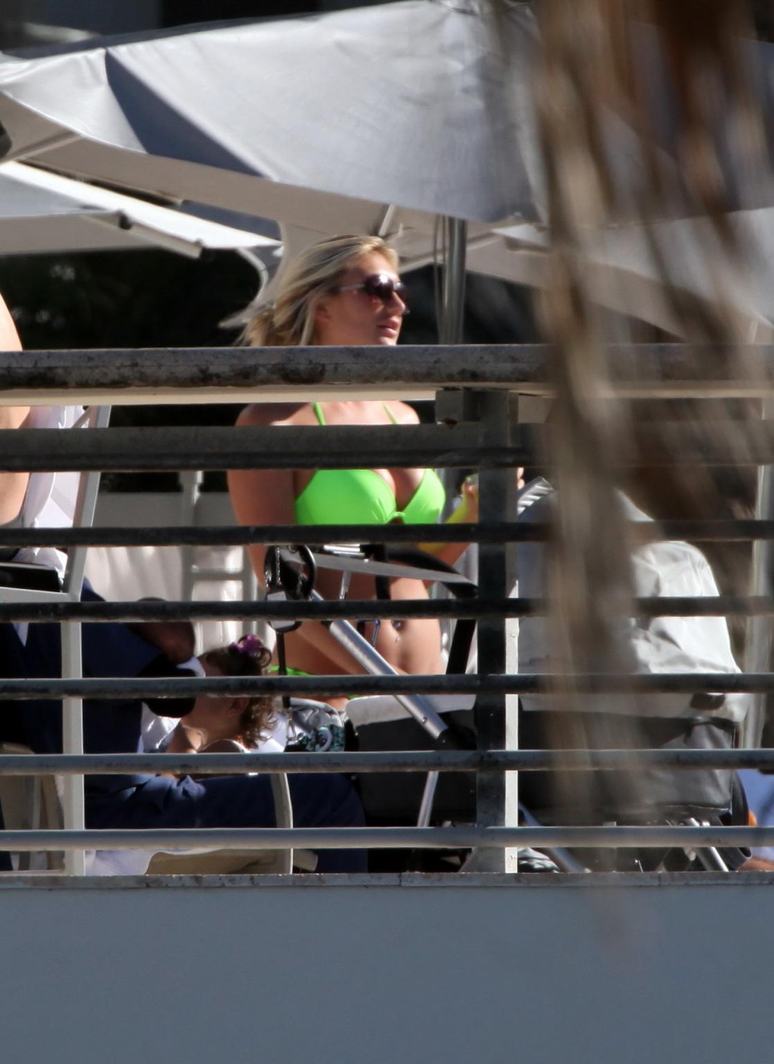 16P Brooke Hogan nude in cage for new PETA ad campaign