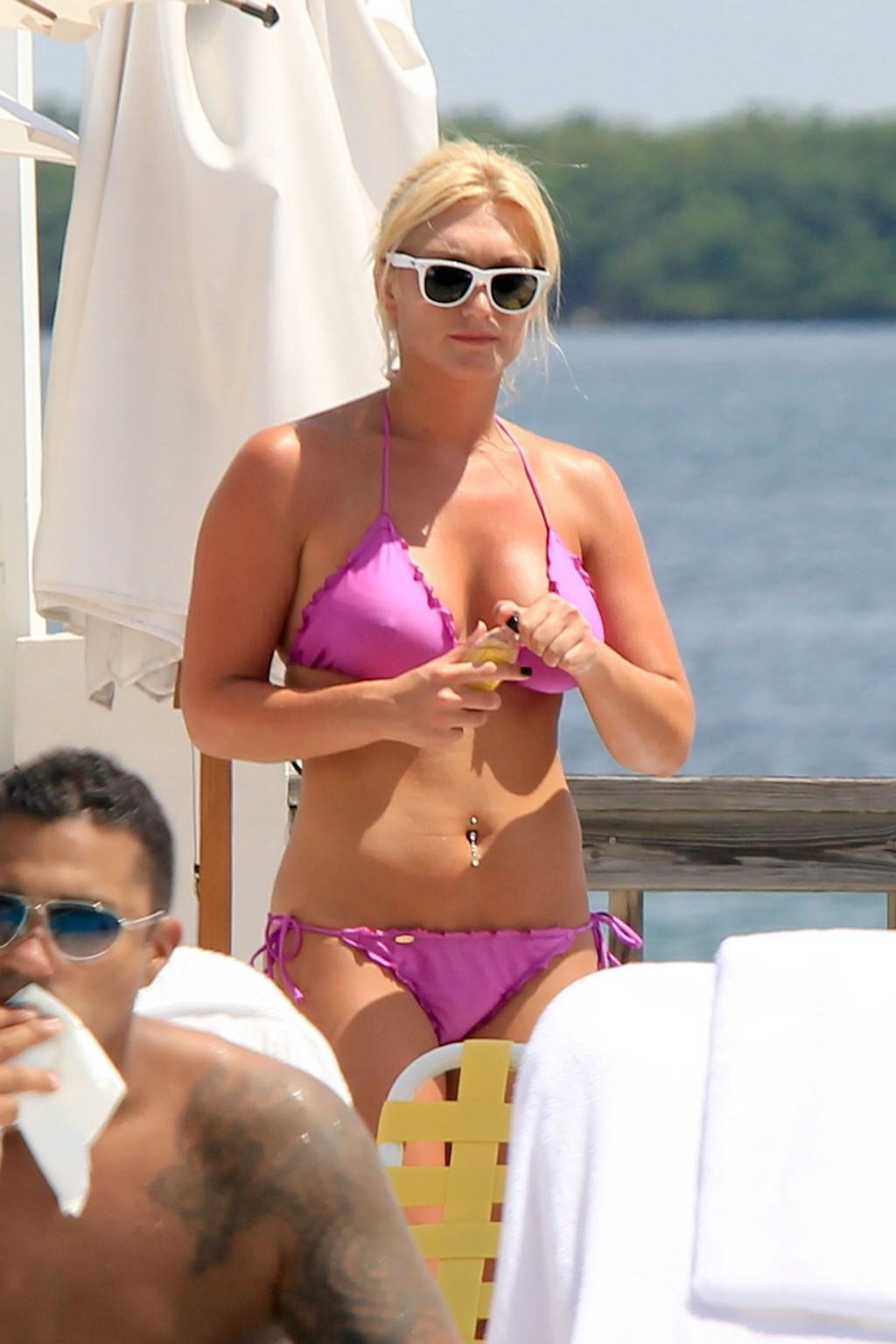 16P Brooke Hogan nude in cage for new PETA ad campaign