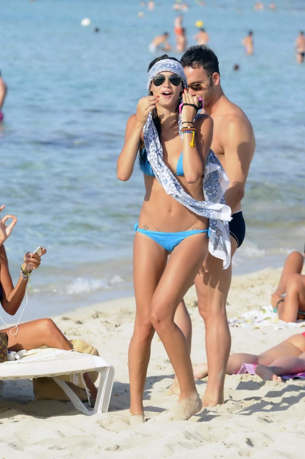 16P Melissa Satta shows off her ass  cameltoe wearing wet bikini on Formentera Beach