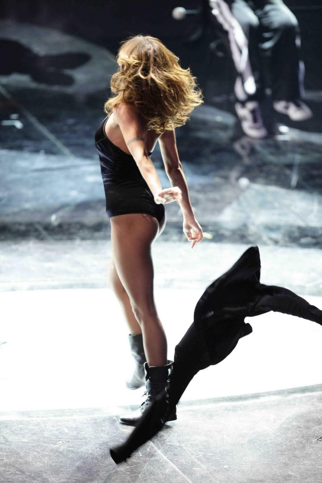16P Elisabetta Canalis shows off her ass  cameltoe wearing black leotard  fishnets o