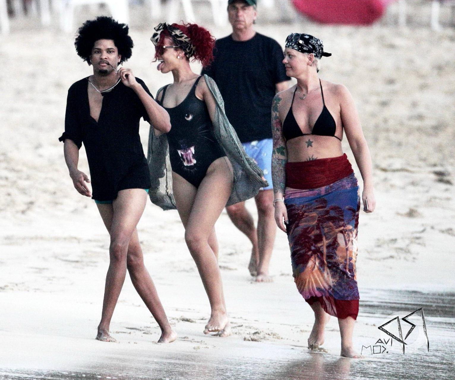 16P Rihanna braless wearing see-through top at the holiday party in Barbados