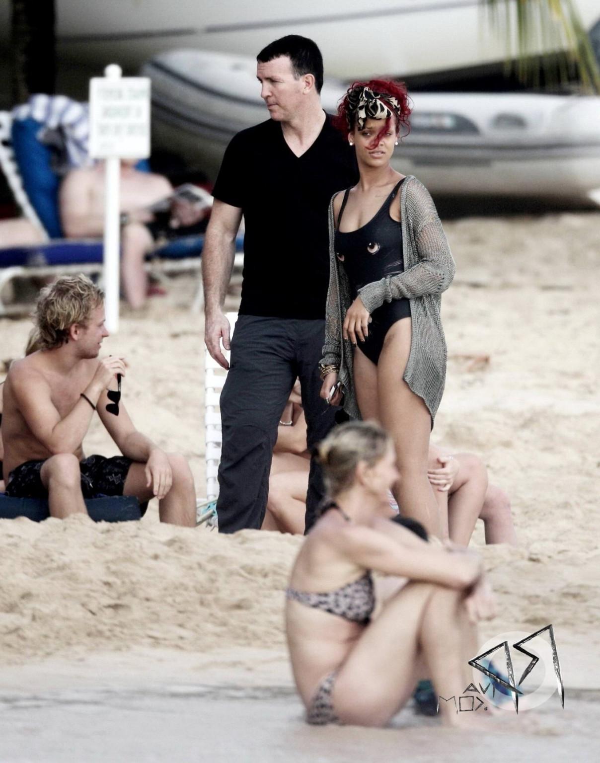 16P Rihanna braless wearing see-through top at the holiday party in Barbados