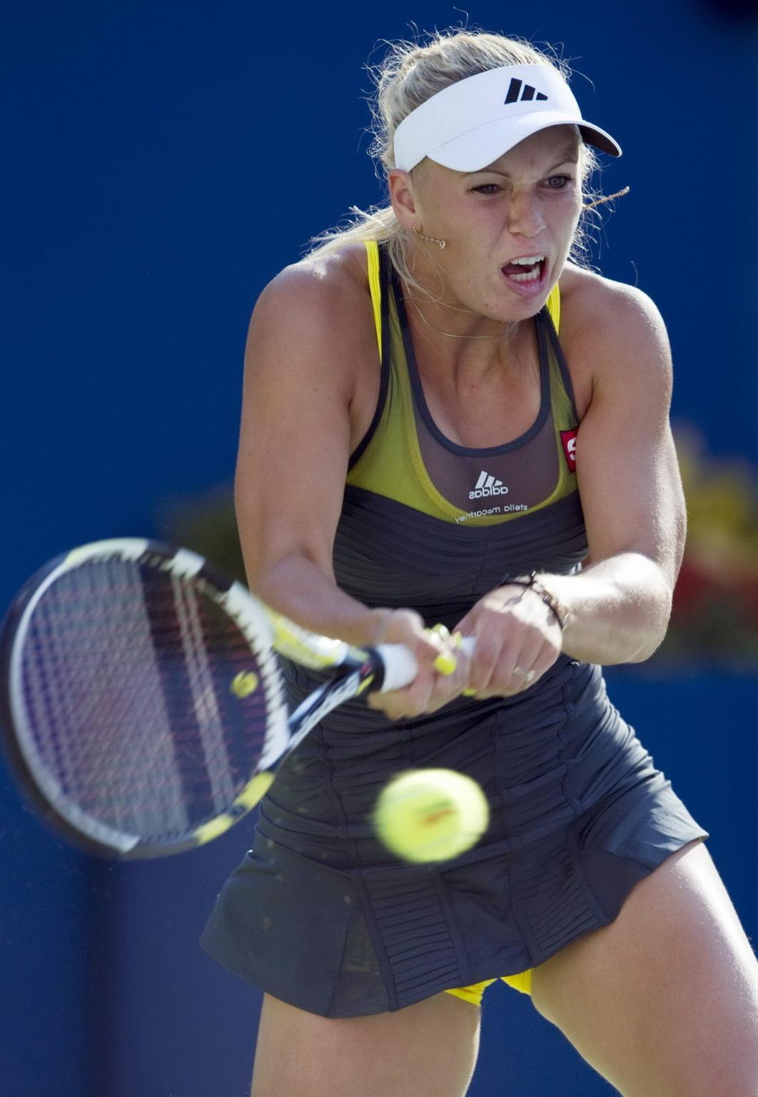 15P Caroline Wozniacki showing cameltoe in sweaty yellow panties at The US Open