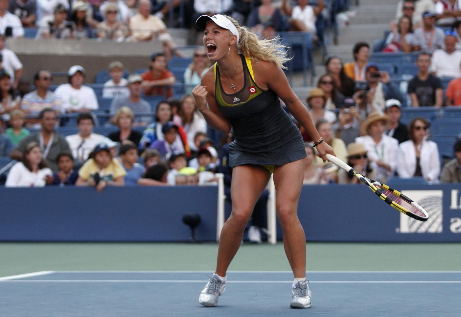 15P Caroline Wozniacki showing cameltoe in sweaty yellow panties at The US Open