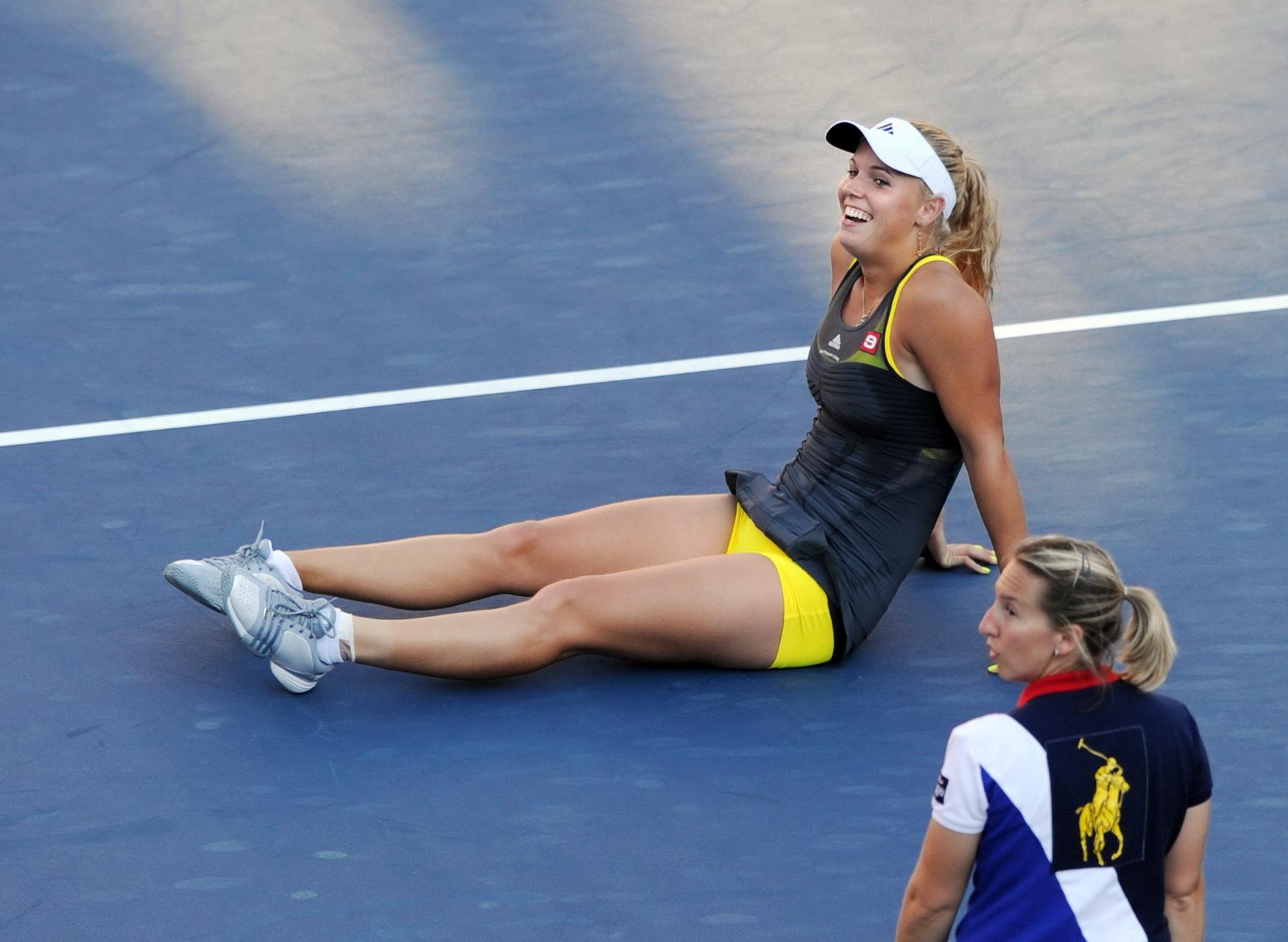 15P Caroline Wozniacki showing cameltoe in sweaty yellow panties at The US Open