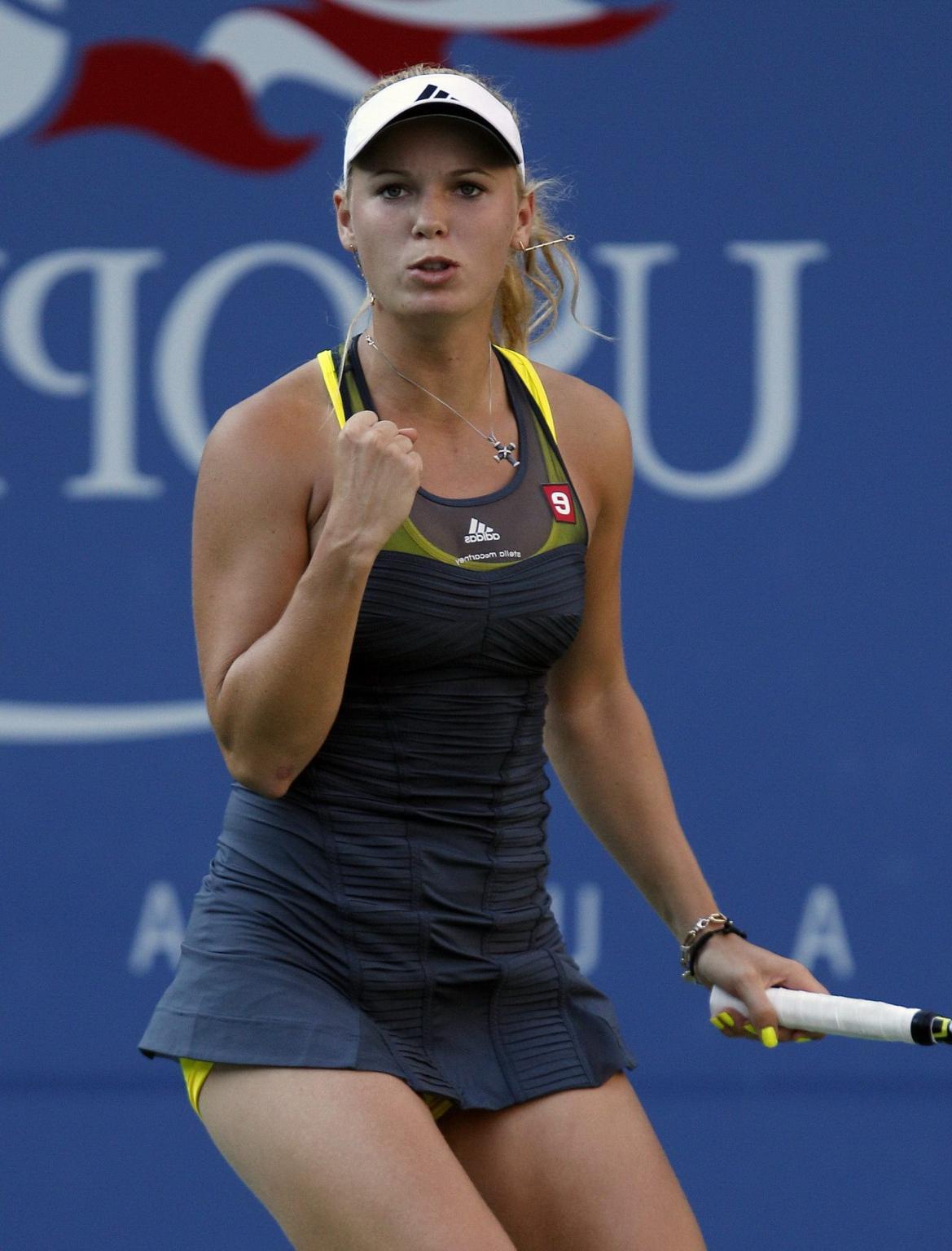 15P Caroline Wozniacki showing cameltoe in sweaty yellow panties at The US Open