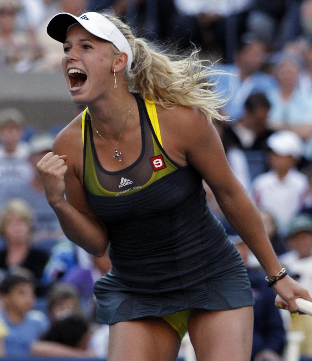 15P Caroline Wozniacki showing cameltoe in sweaty yellow panties at The US Open