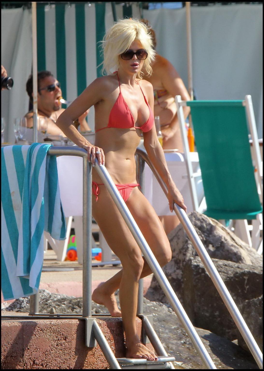 15P Victoria Silvstedt showing cameltoe in skimpy wet bikini at Monte Carlo Beach Cl