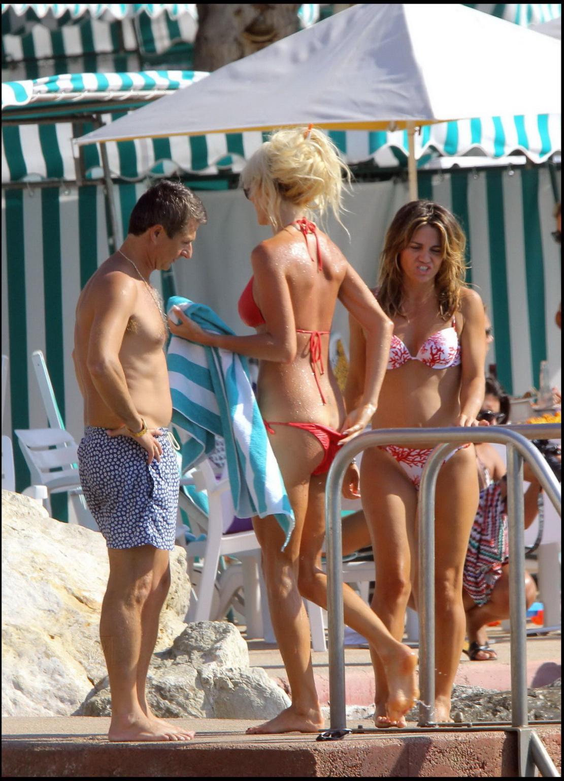 15P Victoria Silvstedt showing cameltoe in skimpy wet bikini at Monte Carlo Beach Cl