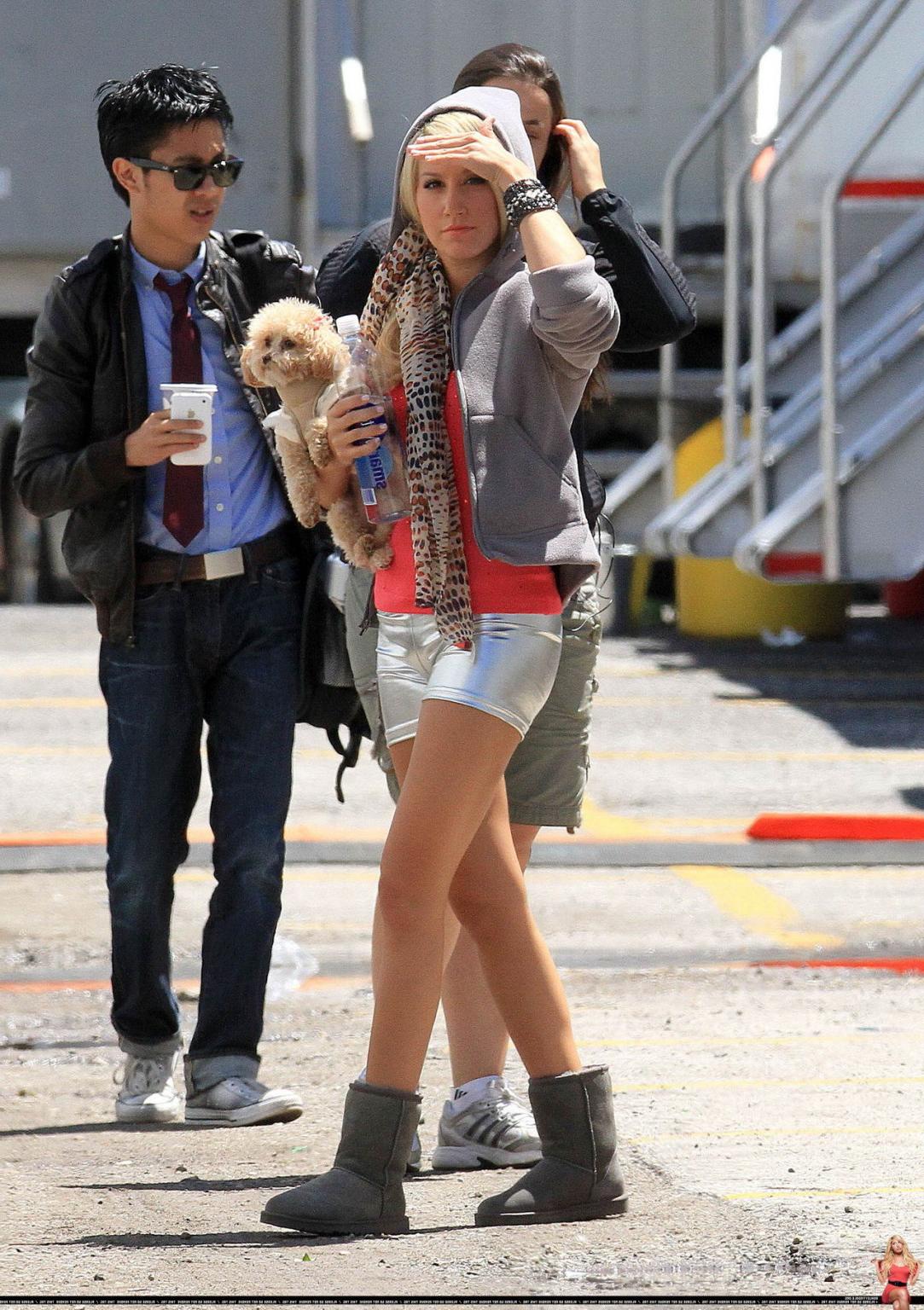 16P Ashley Tisdale showing cameltoe in tight silver shorts on the set