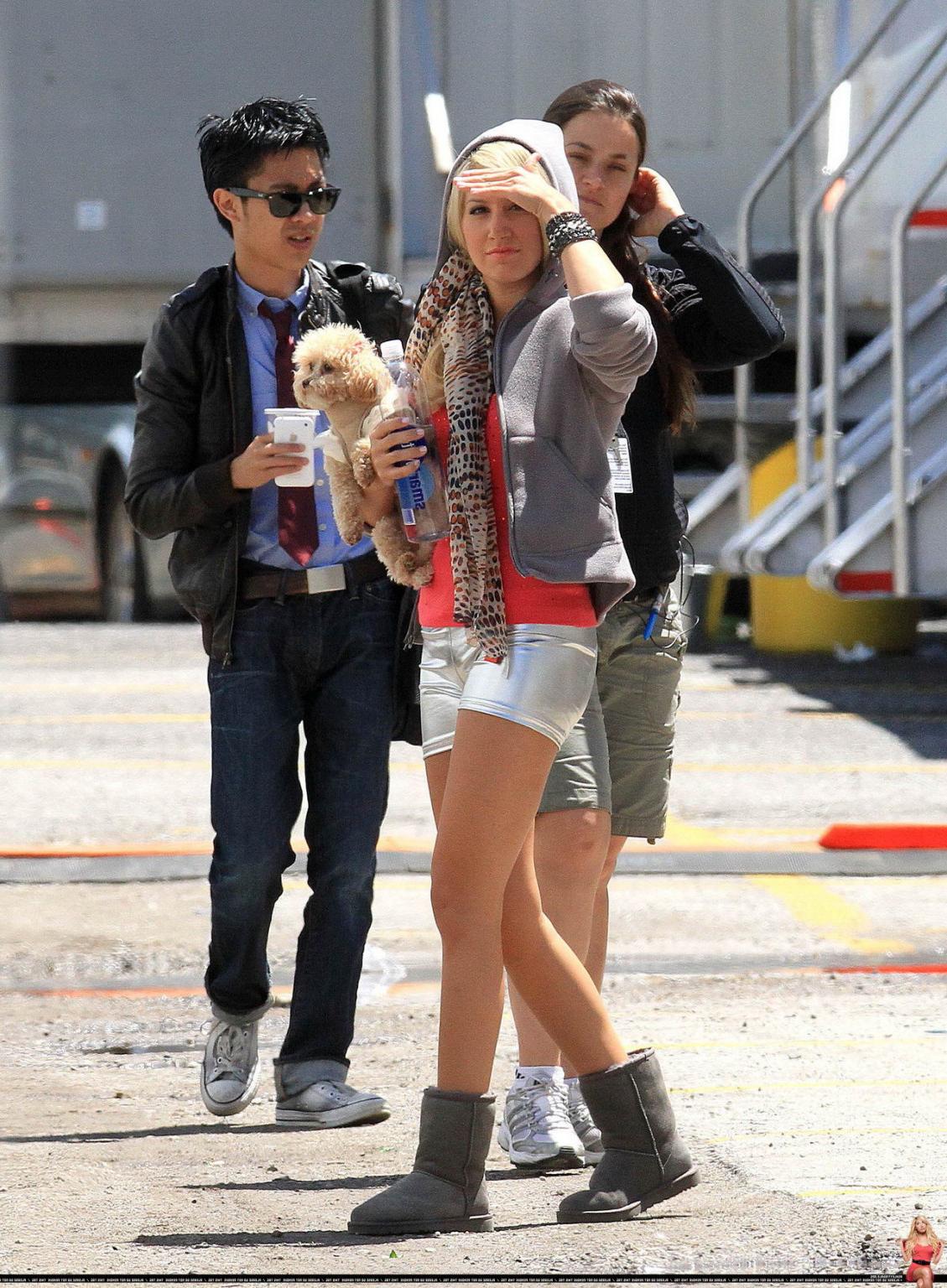 16P Ashley Tisdale showing cameltoe in tight silver shorts on the set