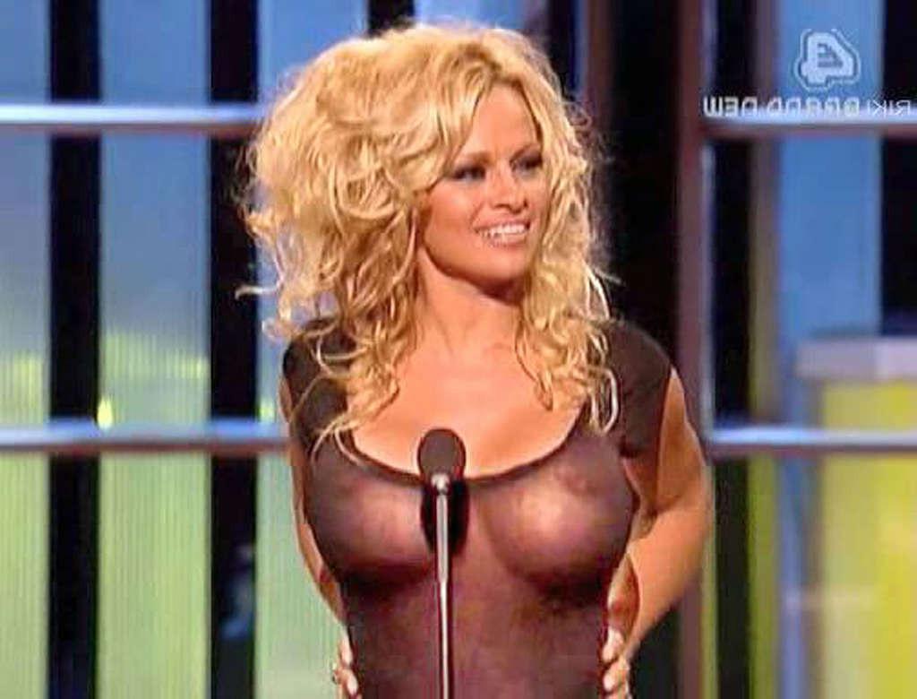16P Pamela Anderson exposing her sexy body and fucking huge boobs