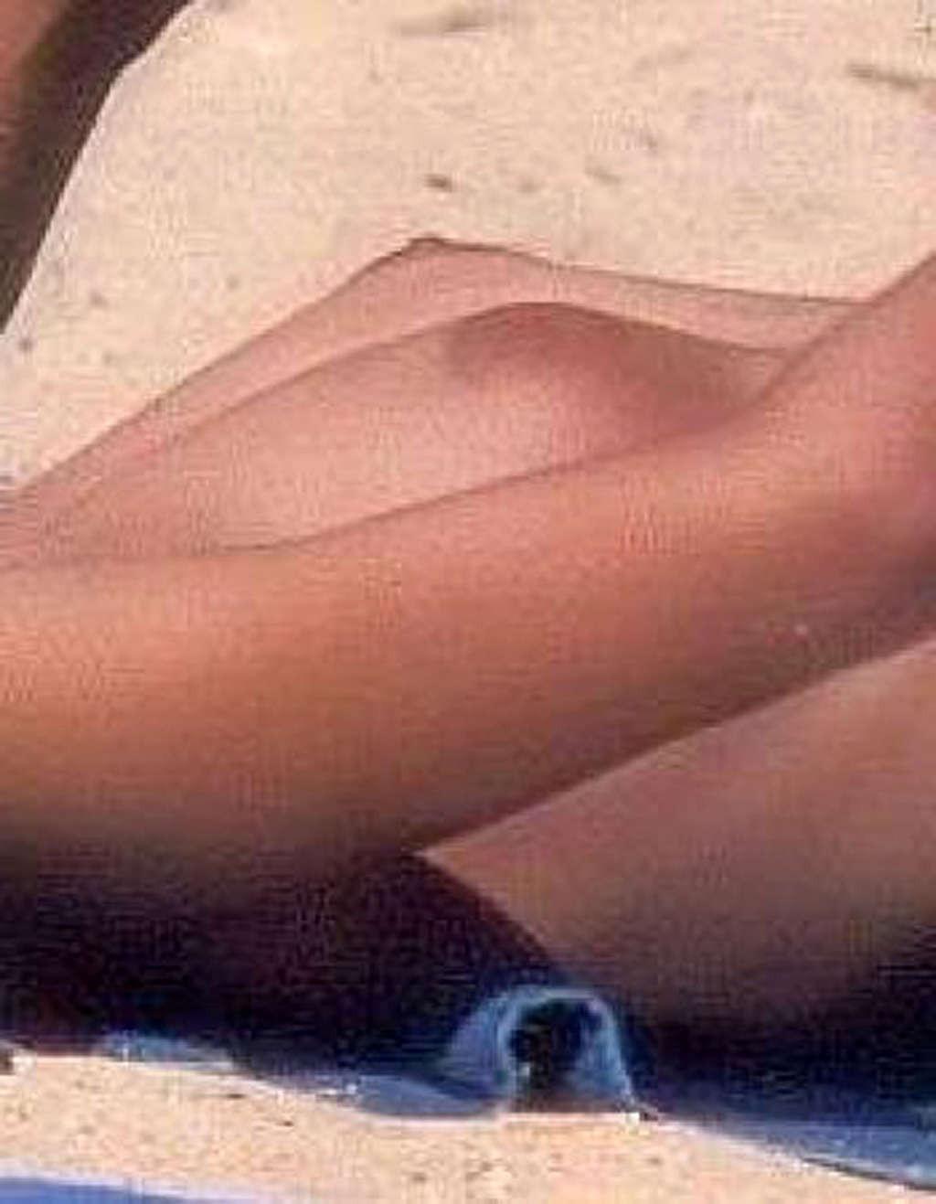 16P Monica Bellucci showing her amazing huge boobs and naked sexy body