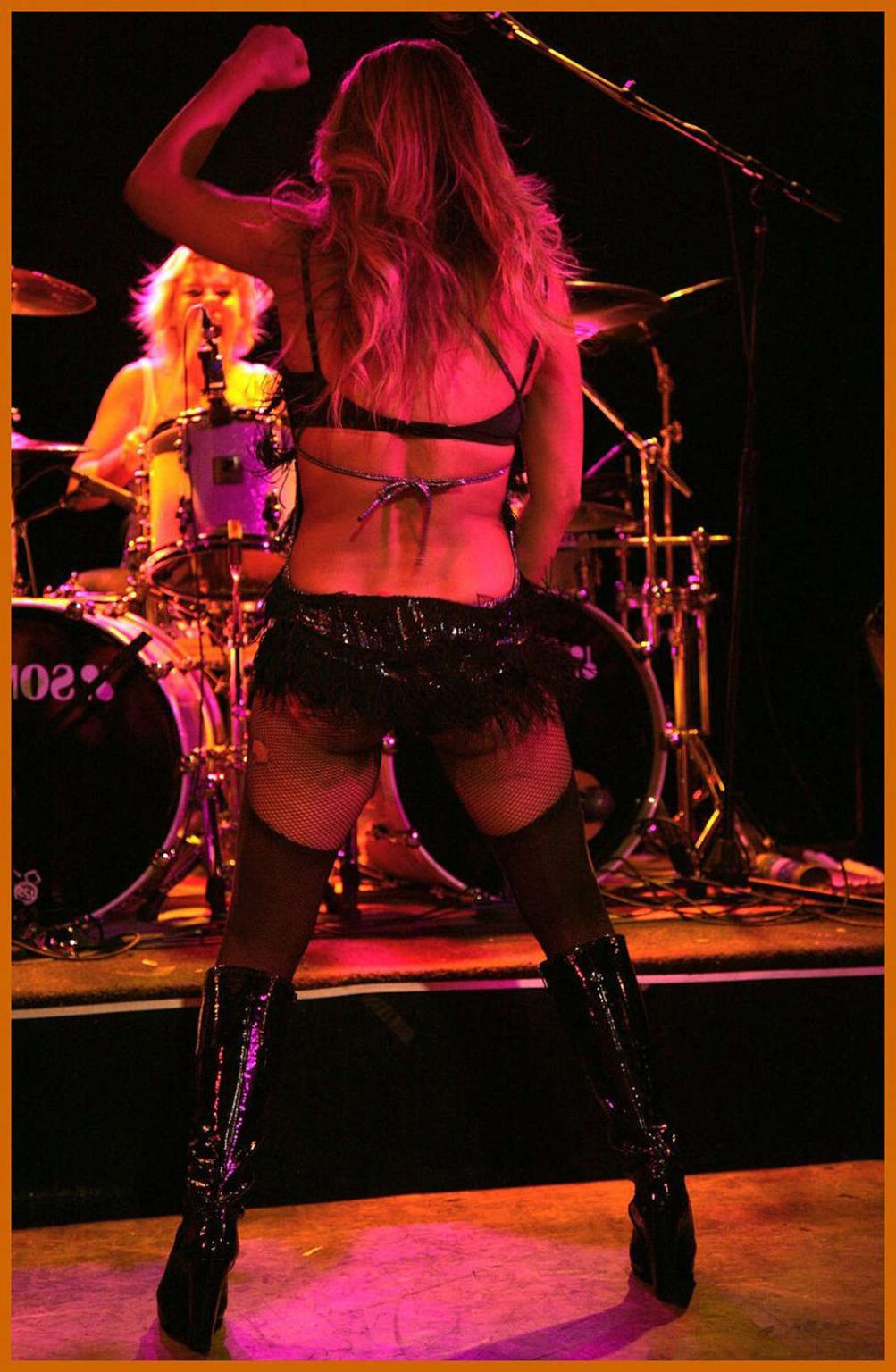 16P Carmen Electra performing striptease in her bedroom on a very sexy way