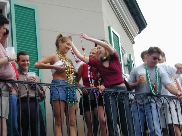15P Drunk slutty babes exposing their tits during mardigras