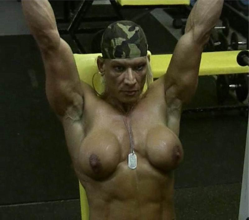 16P female bodybuilder showing off her muscles