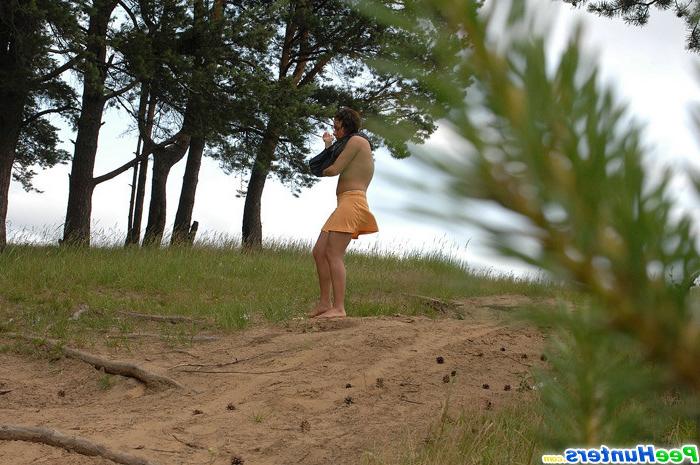 16P Chick strips completely naked and pees in the sand