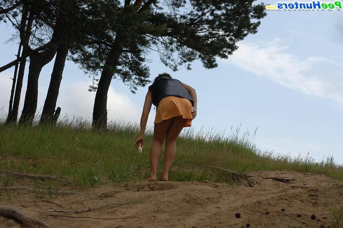 16P Chick strips completely naked and pees in the sand