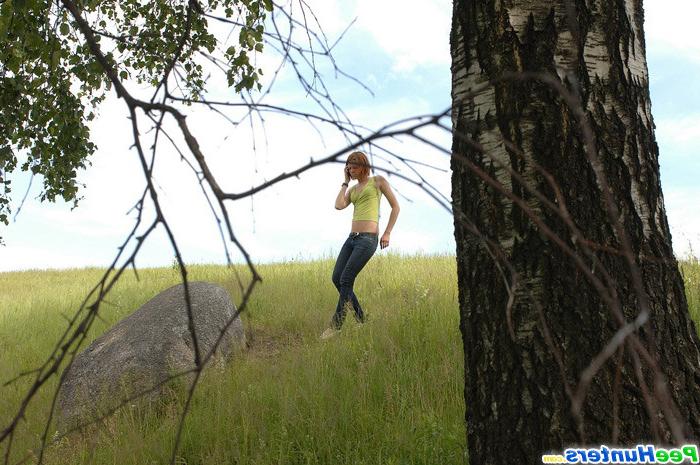 15P Girl loses her pants to take a piss on a rock