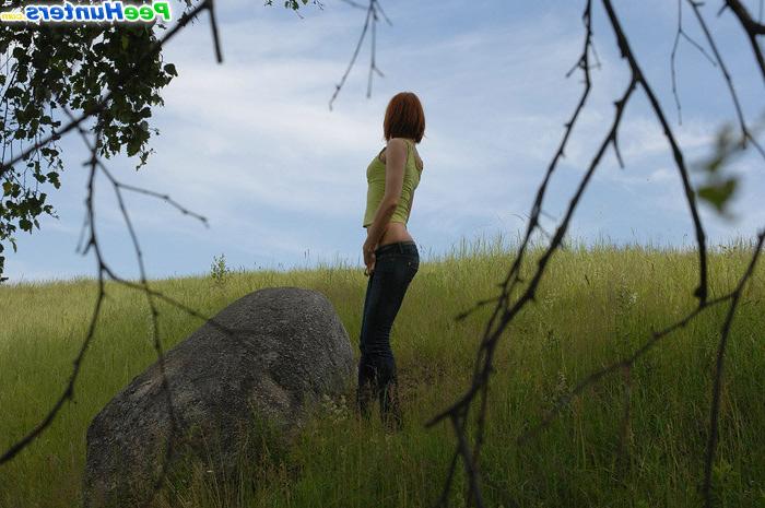 15P Girl loses her pants to take a piss on a rock