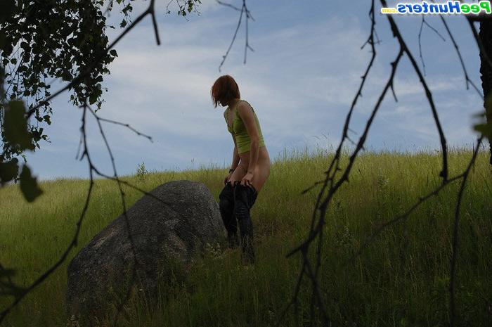 15P Girl loses her pants to take a piss on a rock