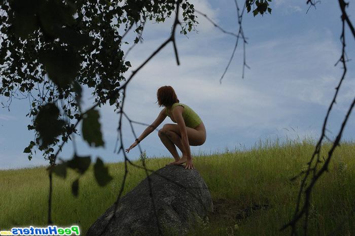 15P Girl loses her pants to take a piss on a rock