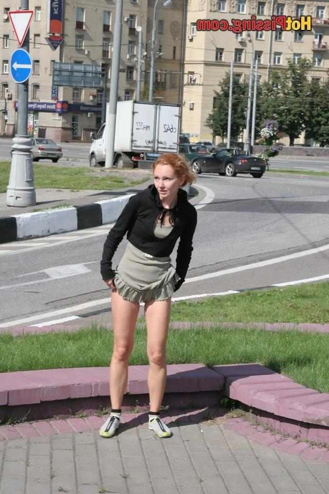 15P Slut pissing outdoors