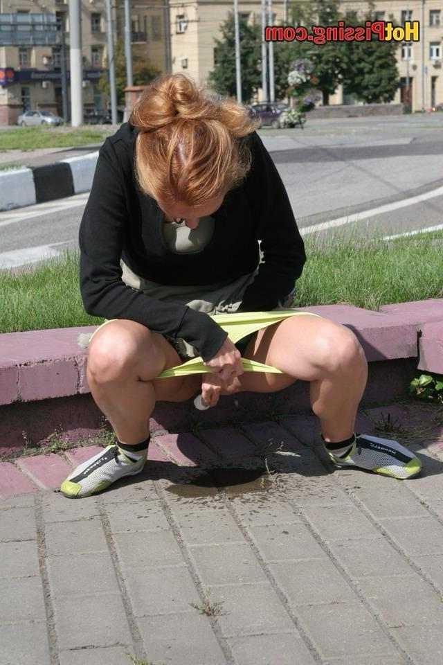 15P Slut pissing outdoors